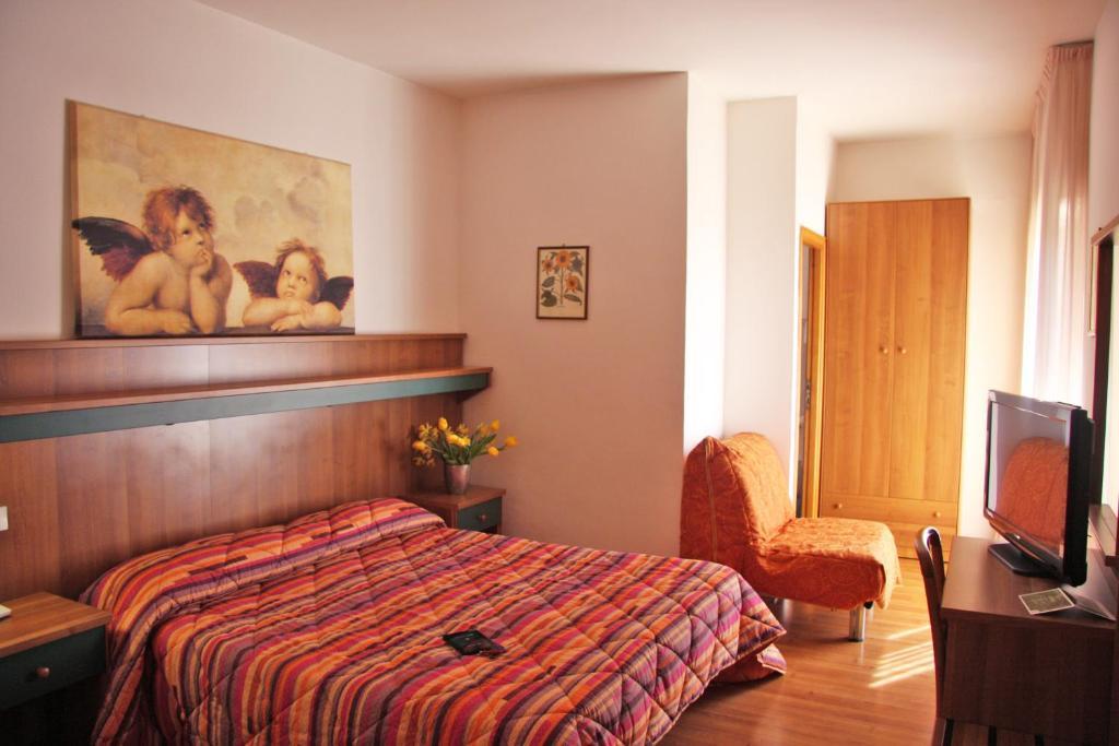 Hotel Los Angeles Asís Habitación foto
