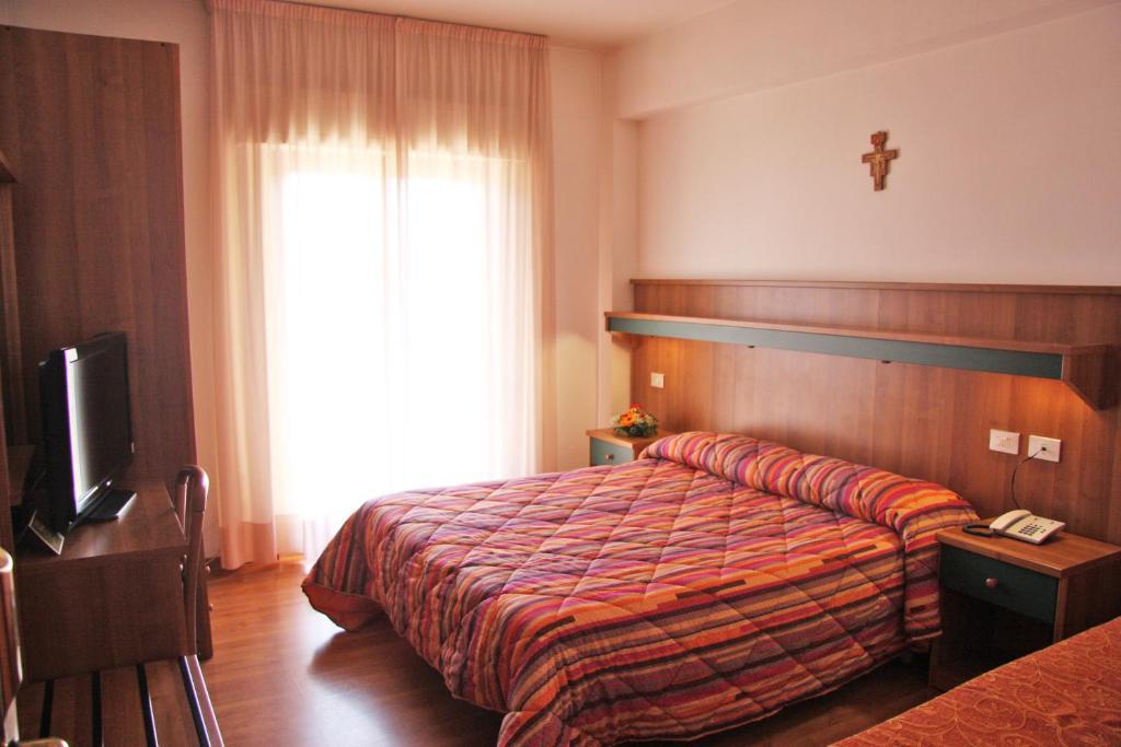 Hotel Los Angeles Asís Habitación foto